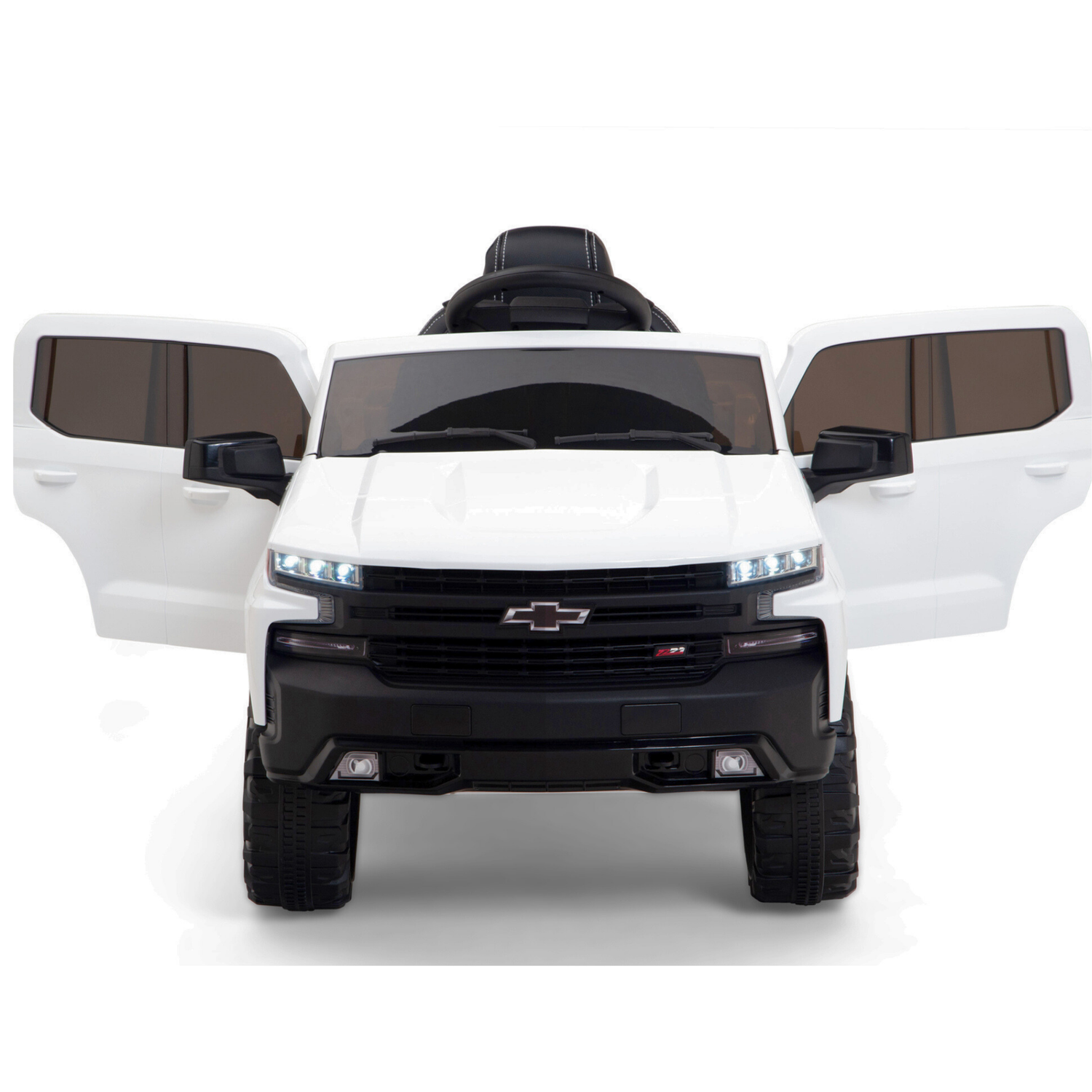 A front view of a White 12V Chevrolet Silverado Kids Licensed 1 Seater Ride On Truck with both doors open reveals a black interior, echoing a miniature pickup design. This ride-on features upgraded elements and iconic details like the prominent grille and headlights, complete with music and remote.
