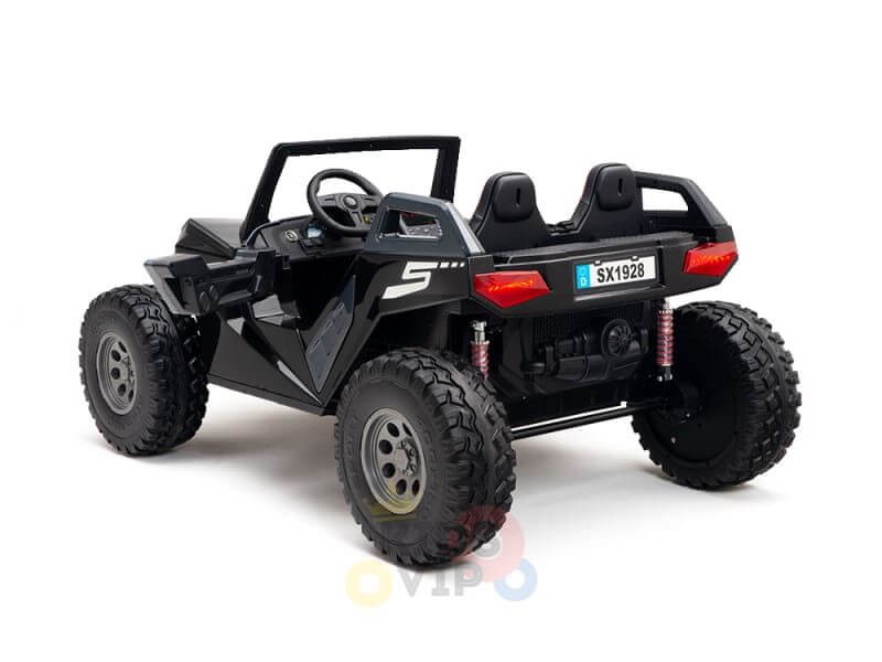 The Black 24V/4X4 Dune Buggy Ride On UTV comes with large rubber wheels, two seats, an open-top design, and red backlights. Resembling a rugged ATV with model number SX1928 on the rear, it includes a steering wheel for kids to enjoy.