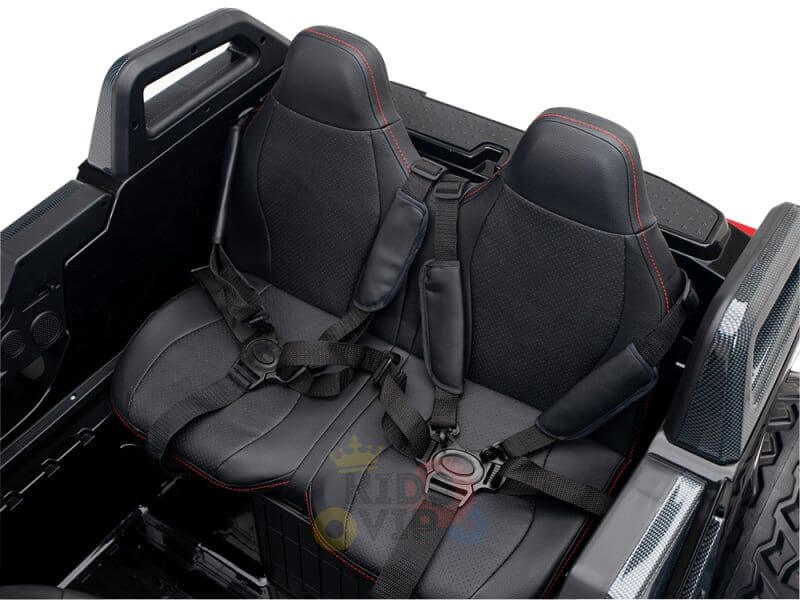 The vehicles rear holds two black bucket seats with red stitching and safety harnesses, enhancing its rugged design. Ideal for adventurers, this Kids XXL Ride On offers a minimalistic black interior like the Black 24V/4X4 Dune Buggy Ride On UTV, featuring durable rubber wheels.