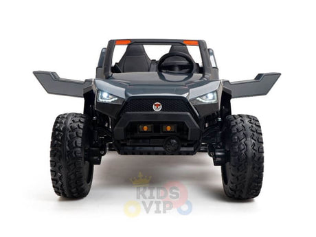 The Black 24V/4X4 Dune Buggy Ride On UTV mimics a rugged off-road vehicle with its angular design, open seating, distinctive headlights, and large rubber wheels. Its perfect for mini explorers ready to tackle any terrain.