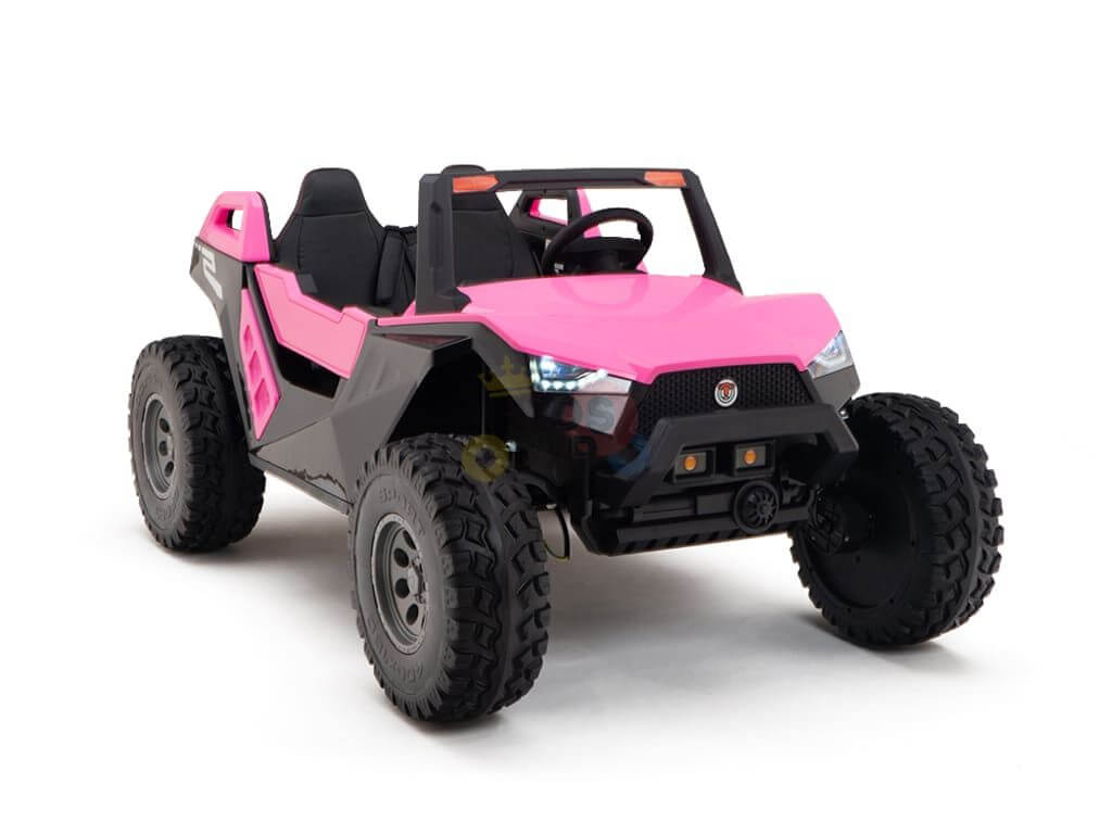 The Pink 24V/4X4 Dune Buggy Ride On UTV for kids is a pink and black ride-on with four rubber wheels, two seats, front lights, and detailed interiors for an adventurous experience.