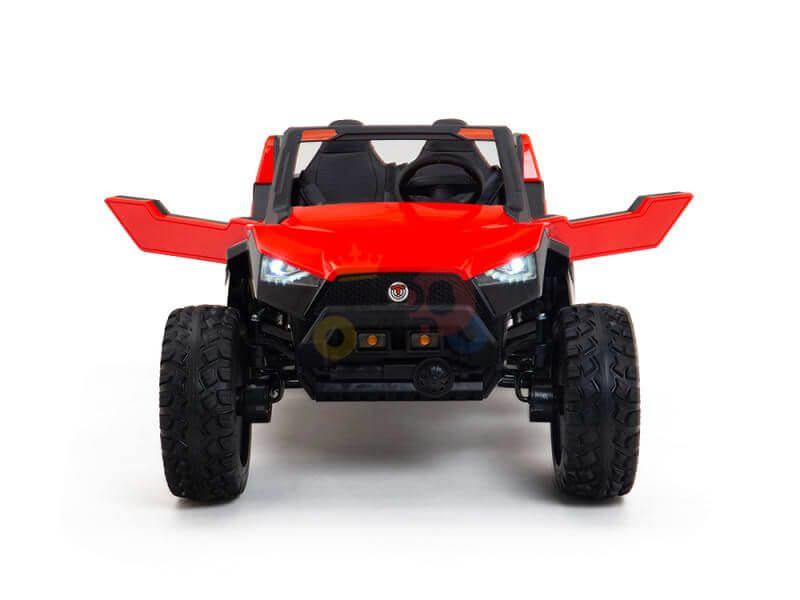 The Red 24V/4X4 Dune Buggy Ride On UTV with rubber wheels and RC features a front view showcasing sporty headlights, angular fenders, and an open-top design. Its rugged off-road style is perfect for childrens adventurous play.