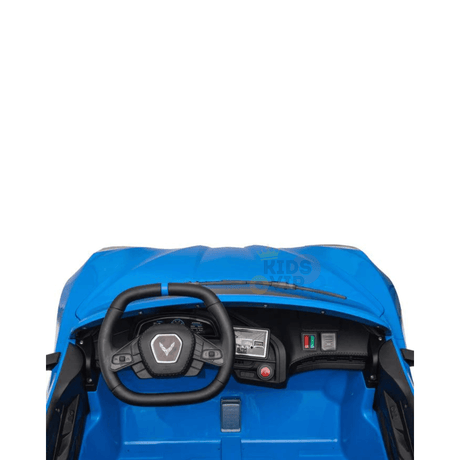 The Kids Premium 24V Blue Corvette C8 Dual-Seater includes a blue dashboard with a winged emblem steering wheel, decorative controls, and faux display. It features EVA wheels, luxurious leather seats, and remote control for an authentic ride-on car experience.