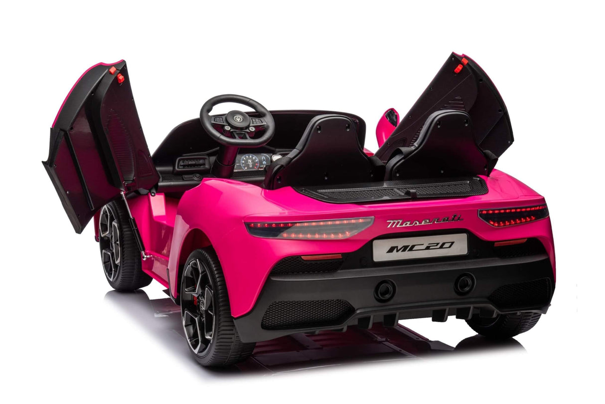 The Experience Luxury: Pink XXL 24V /105W Maserati MC20 is a premium ride-on with butterfly doors, black leather seats, dashboard details, and red brake calipers. Perfect for kids, it includes a steering wheel, rear lights, and rubber tires for realism.