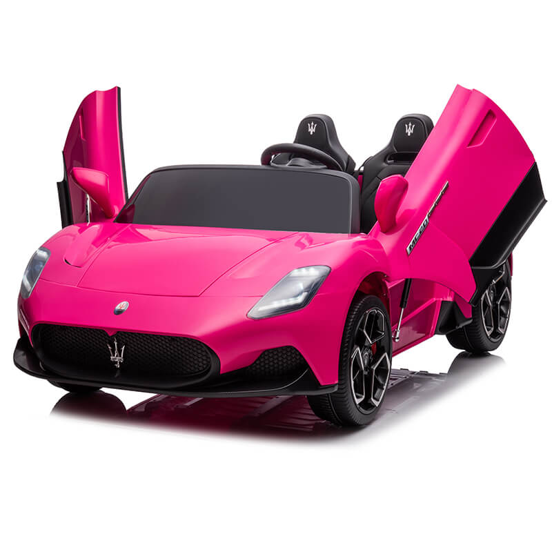 The Experience Luxury Pink XXL 24V Maserati MC20 is a ride-on toy car styled like a luxury sports car, featuring upward-opening doors, black racing seats with headrest logos, headlights, and alloy wheels.