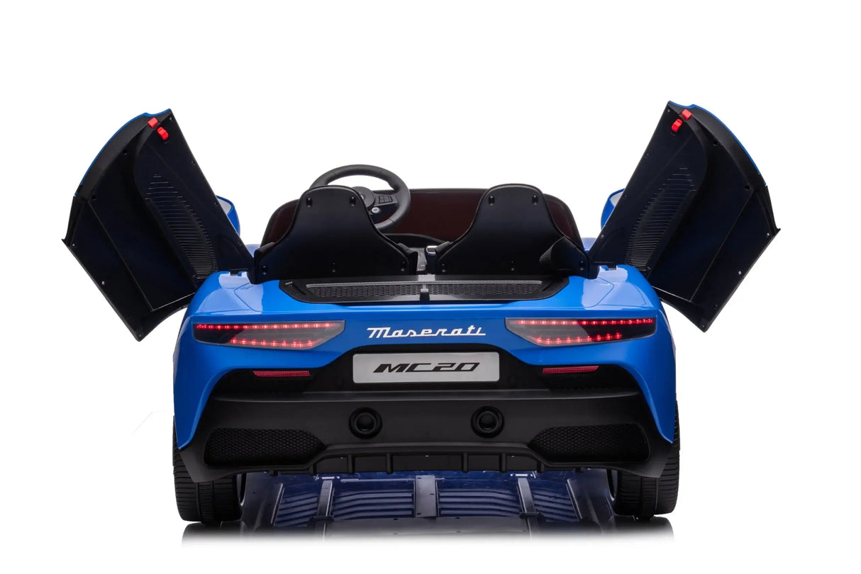 The blue Maserati MC20 showcases its rear with elegantly open butterfly doors, featuring a black and red interior, glowing rear lights, and Maserati and MC20 logos—a luxury ride-on for enthusiasts. Experience this premium 2-seater: the XXL 24V/105W model with RC, leather seats, and rubber tires.