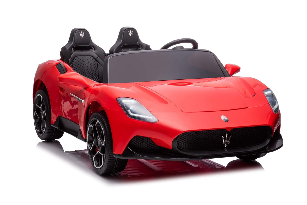 The Experience Luxury: Red XXL 24V Maserati MC20 is a premium childrens ride-on with a sleek sports car design, two leather seats, rubber tires, and detailed features like the grille and headlights—perfect for young drivers.