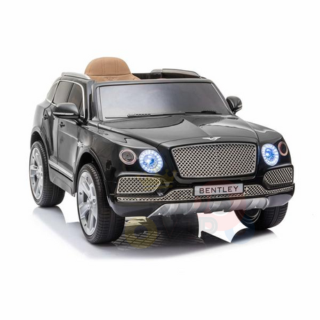 The Black Licensed Bentley Bentayga Complete Edition 12V Kids Ride On Car features realistic details like headlights, a front grille, and Bentley branding. It has silver wheels and a tan leather seat, resembling a luxury SUV. A parental remote is included for safe supervision.