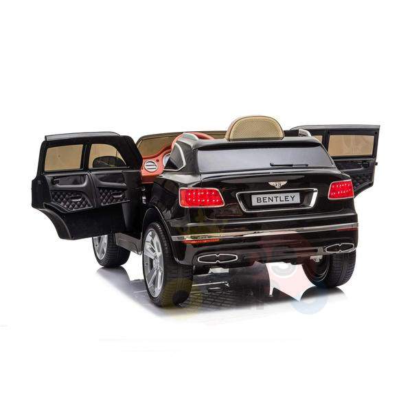 The Black Licensed Bentley Bentayaga Complete Edition 12V Kids Ride On Car with RC is shown from the rear with open doors, realistic taillights, a visible brand emblem, and detailed leather seating.