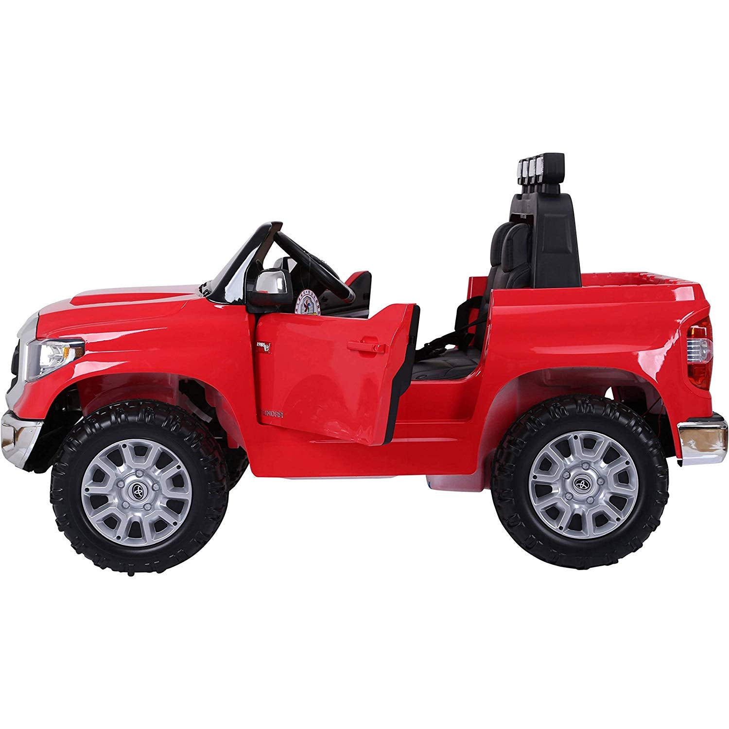 Introducing the Red 12v Licensed Toyota Tundra, a stylish kids ride-on truck. This modern toy features an open-top design with a detailed interior, ajar drivers side door, black seats, large silver wheels, and off-road tires—all set against a plain white backdrop.