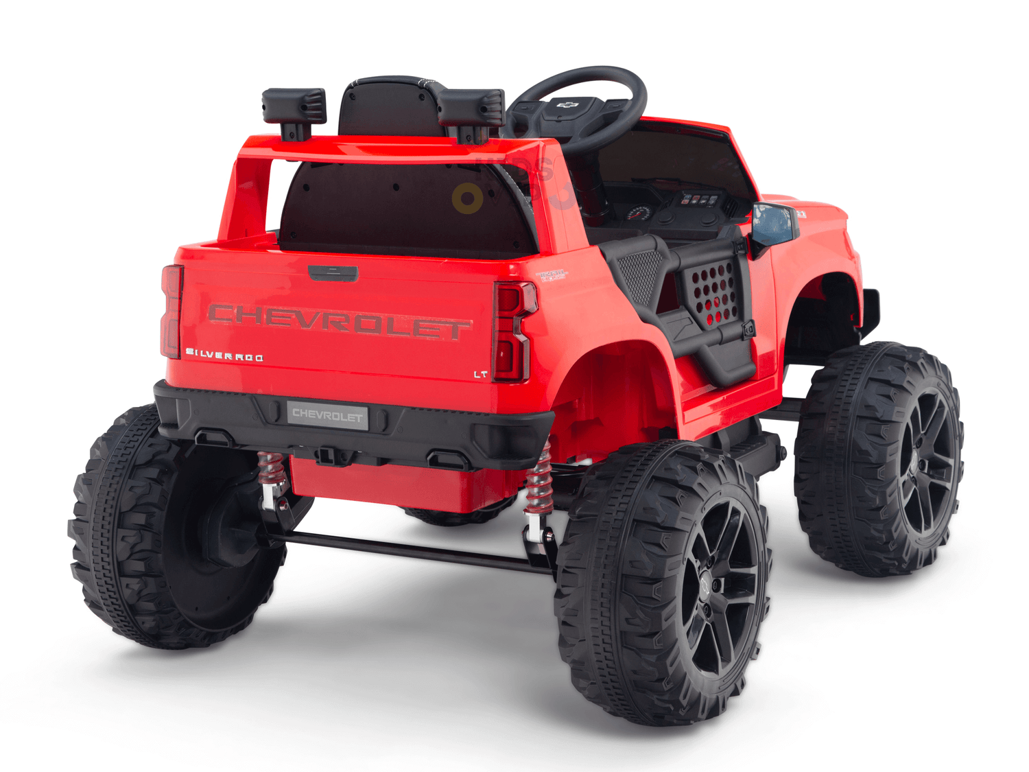 The Red 24V Chevrolet Silverado Kids Licensed 1 Seater Ride On Lifted Truck features oversized wheels, a steering wheel, and a dashboard. Elevated with a suspension system, it mimics an off-road vehicle for adventurous play.