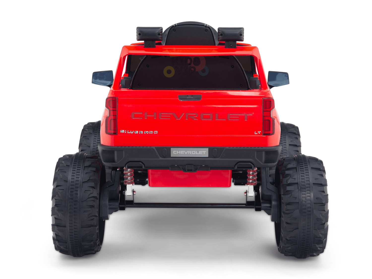 The Red 24V Chevrolet Silverado Kids Licensed 1 Seater Ride On Lifted Truck with Remote features rear-view details, oversized wheels, the Chevrolet logo, suspension springs, and chunky treads for an authentic mini off-road design.