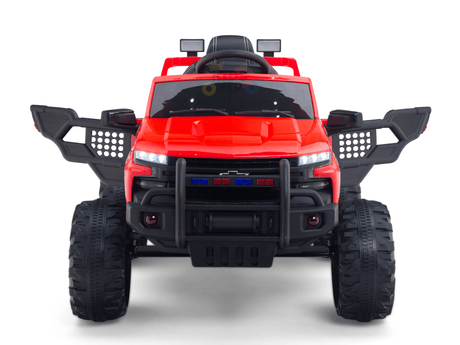 The Red 24V Chevrolet Silverado Kids Licensed 1 Seater Ride On Lifted Truck with Remote features oversized wheels, black accessories like a grill guard and side mirrors, openable doors with a steering wheel inside, and front LED lights alongside police-style blue and red lights.