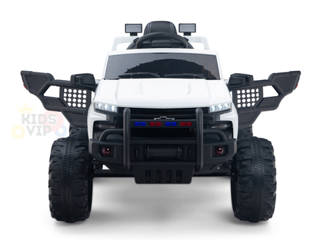 The White 24V Chevrolet Silverado Kids Licensed 1 Seater Ride On Lifted Truck combines a sleek design, oversized black wheels, side mirrors, and a front brush guard with blue and red lights for an adventurous look.