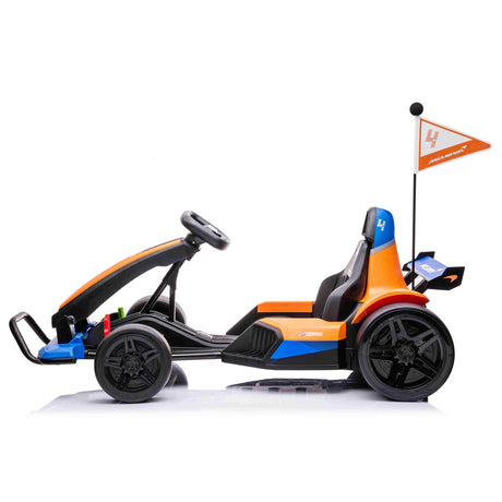Side view of an Orange 24V Official Complete Edition McLaren Super Drifting Go-Kart with black seat, steering wheel, number 4, and matching flag. This kids ride-on has a sleek, sporty design perfect for little racers.