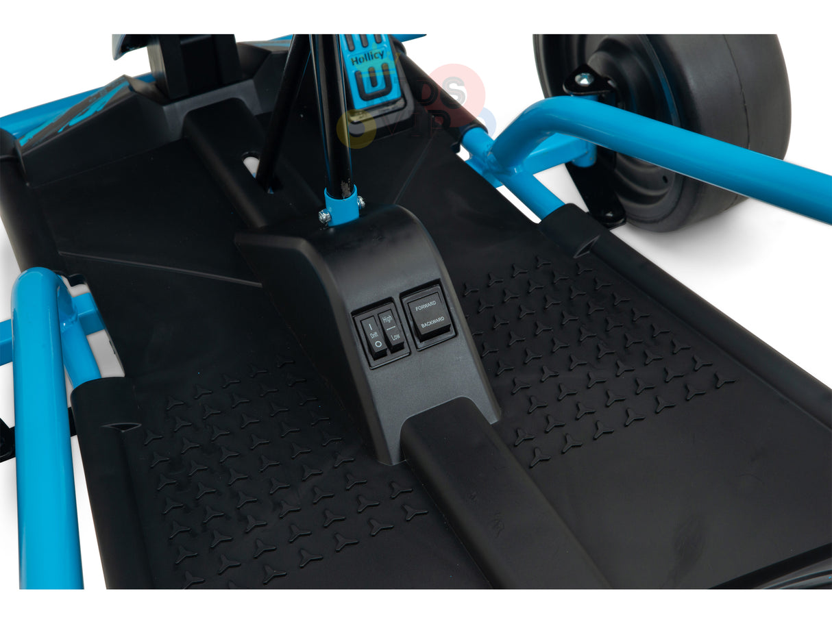 A close-up of the Blue 24V Sport Challenger Outdoor Drifting Kids Go Kart reveals black textured footrests and control switches on a panel. The kart has a rugged design with visible steering and wheel components, powered by robust 24V motors.