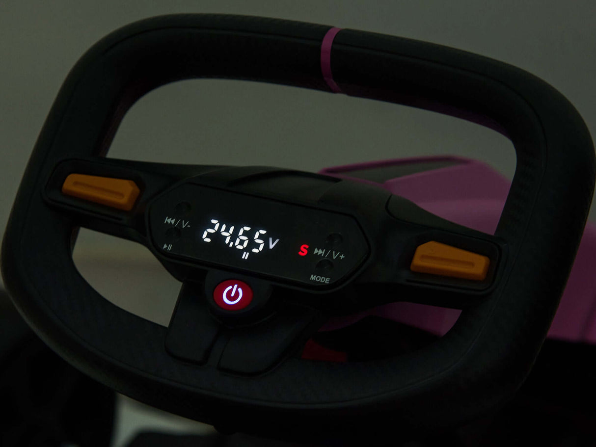 Close-up of a steering wheel designed for the Big Kids Powerful 24V Speedster Drifting Go-Kart, featuring an electronic display showing 24.65V and a red S symbol. Highlighted with yellow buttons and a bold red power button, it offers a sleek, modern look for the ultimate go-karting thrill.