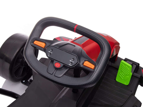 Close-up of a steering wheel on a red Big Kids Powerful 24V Speedster Drifting Go-Kart features orange buttons, a red center power button, and behind it, a green pedal is visible. It includes black seat details and EVA-rubber wheels for smooth drifting.