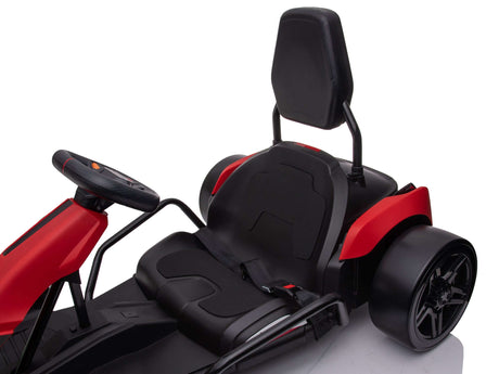 A close-up of the Big Kids Powerful 24V Speedster Drifting Go-Kart seat with a steering wheel showcases a red and black high backrest seat with a seatbelt. Partially visible sleek EVA-rubber wheels reveal the 24V HP motors, adding to its modern and sporty allure.