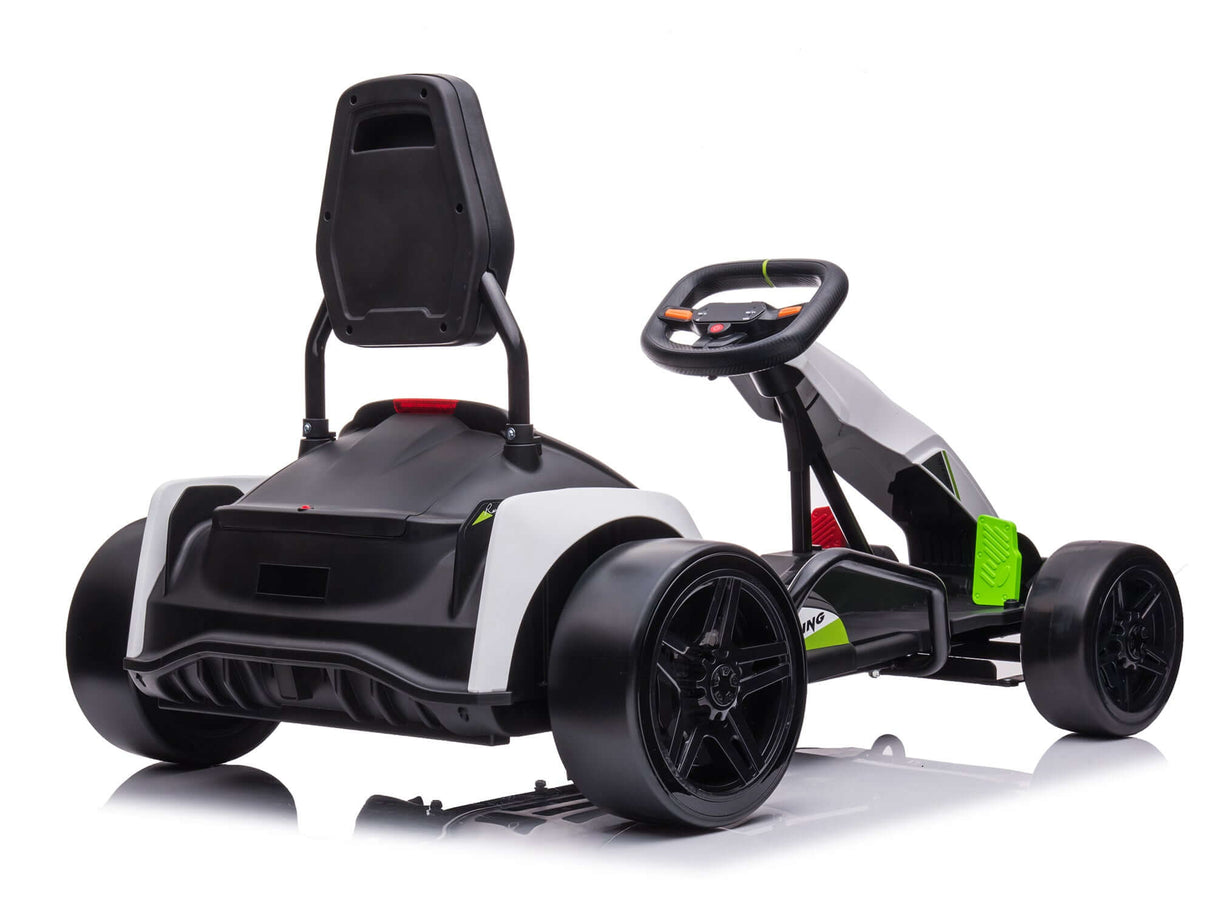 The Big Kids Powerful 24V Speedster Drifting Go-Kart, in black and white with green accents, includes four black wheels, a racing seat, and a steering wheel. Designed for older kids, it is shown from a rear-side angle to highlight its sleek design.