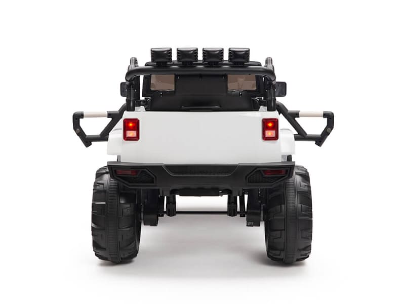 Rear view of the White 12V Sport Edition Trailcat Big Wheels Kids Ride-on Truck with large black wheels, roll bars, and red tail lights. This model features an off-road design with rugged elements, ideal for adventurous little drivers.