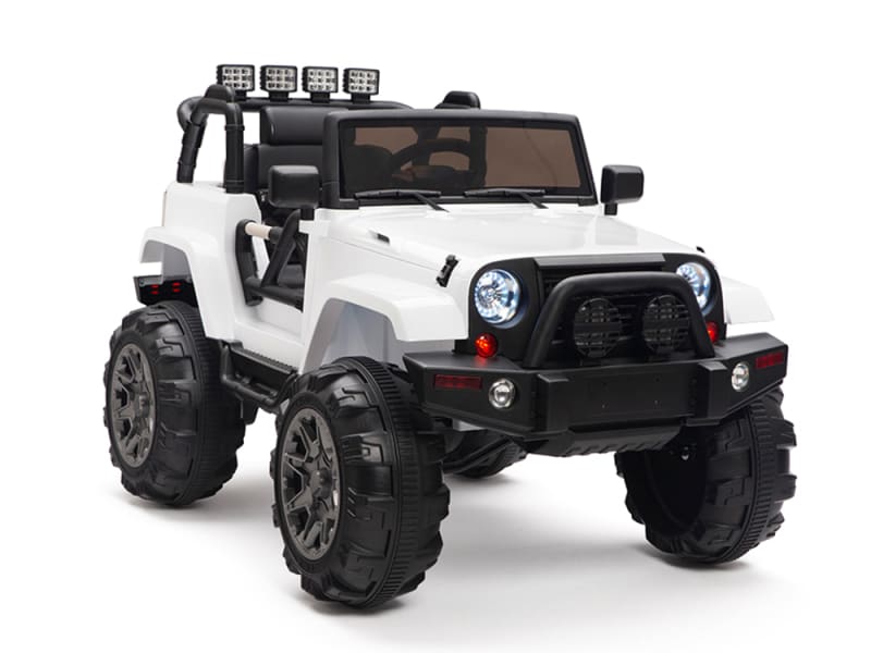 Meet the White 12V Sport Edition Trailcat Big Wheels Ride on Truck. This toy jeep features rugged bumpers, large black wheels, mounted spotlights, and an open roof for realistic off-road experiences. For safety, it includes a parental remote control.
