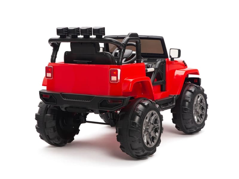The Red 12V Sport Edition Trailcat Big Wheels Kids Ride on Truck with RC is a toy off-road vehicle, featuring oversized wheels, silver rims, an open-top design with a black seat, and realistic truck details.