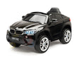 The Limited Licensed BMW X6M 12v Kids Ride On Car features a sleek black design, large wheels, realistic grill, illuminating headlights, and child-friendly seat. With high-performance elements and a parental remote control, this miniature marvel enhances playtime significantly.