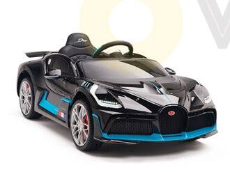 A toy car modeled after the 12v Bugatti Divo has sleek curves, low profile, a stylish blue steering wheel, realistic details, and silver wheels with red accents.