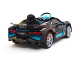 Introducing the stylish black and blue 12v Bugatti Divo ride-on car with silver wheels and rear spoiler. Its small steering wheel makes it perfect for children. Dont miss this final sale opportunity to upgrade your ride!.