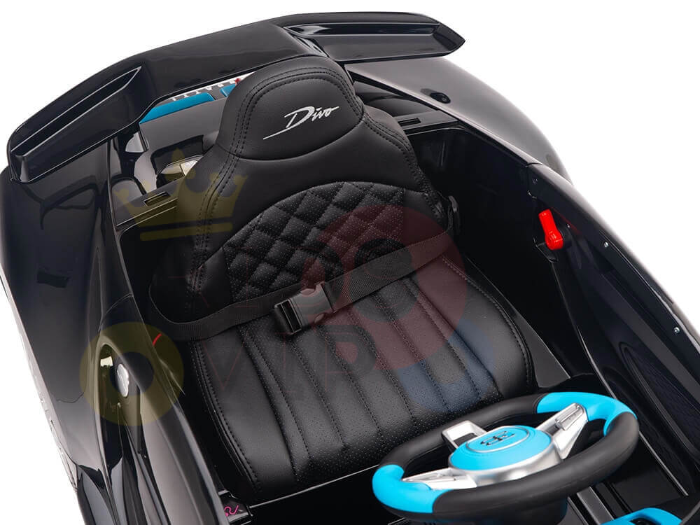 Interior view of the 12v Bugatti Divo ride-on car showcasing a quilted black seat with Divo on the headrest, a blue and black steering wheel, and a red switch. Its sleek, sporty design is perfect for little adventurers. Enhance performance today! Contact us for inquiries!.