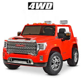 A vibrant red ride-on GMC truck, resembling the rugged Sierra with its large grille and chrome accents, features 4WD capability for adventurous play. It includes detailed tires and a 4WD text above the truck on a plain white background. Upgrade to the 12V/2 Seater Hood today!.