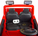 The Blue GMC Sierra 4WD Ride On Car features two luxurious leather seats and a white steering wheel with black accents. It includes two overhead lights and a GMC logo on the dashboard, providing young drivers an adventurous ride.