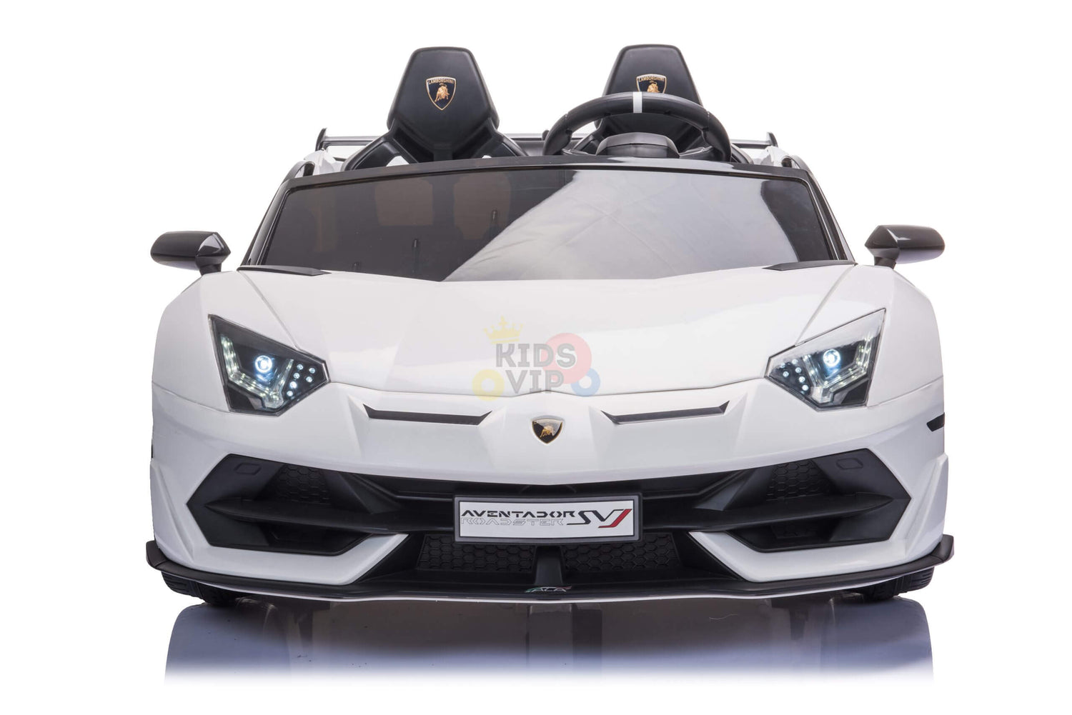 The Upgrade Your Ride with the White 24v Lamborghini SVJ Drifting Kids Ride on Car boasts a sleek design with detailed headlights and steering wheel, powered by a robust 24V battery. Perfect for adventurous playtime, this stunning toy car faces forward against a white background.
