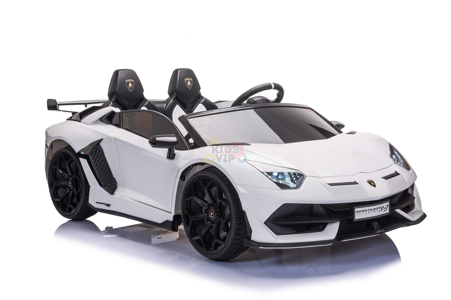 The Upgrade Your Ride with the White 24V Lamborghini SVJ Drifting Kids Ride on Car is a two-seater featuring a sportscar design, black wheels and seats, drifting wheels for excitement, luxury styling with a detailed steering wheel, and a Kids VIP logo on the windshield.