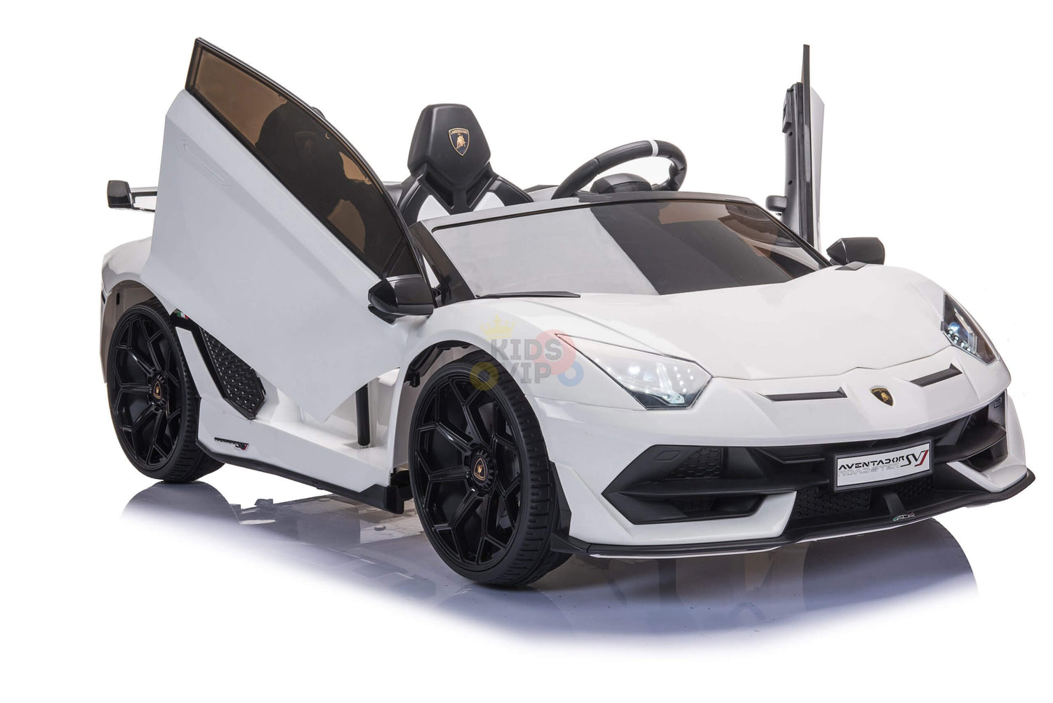 The White 24V Lamborghini SVJ Drifting Kids Ride on Car features upward-opening doors, black wheels, a sleek design, detailed body style with a tinted windshield, and is perfect for children seeking extra excitement.