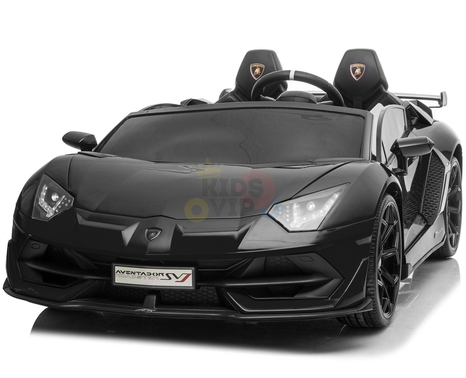 The Black 24V Lamborghini SVJ Ultimate Drifting Car is a sleek ride-on toy for kids, resembling a luxury sports car. It features detailed front headlights, a Lamborghini-style logo on the seats, and drifting wheels for added excitement. The product is showcased from a front angle on a white background.