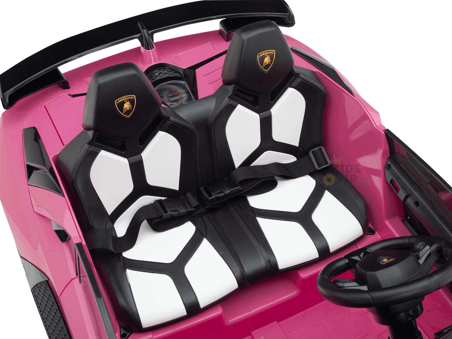 The Upgrade Your Ride with the Pink 24v Lamborghini SVJ Drifting Kids Ride on Car replicates a realistic design, featuring drifting wheels, two black and white leather-style seats with built-in seatbelts, and a steering wheel adorned with the iconic Lamborghini logo.