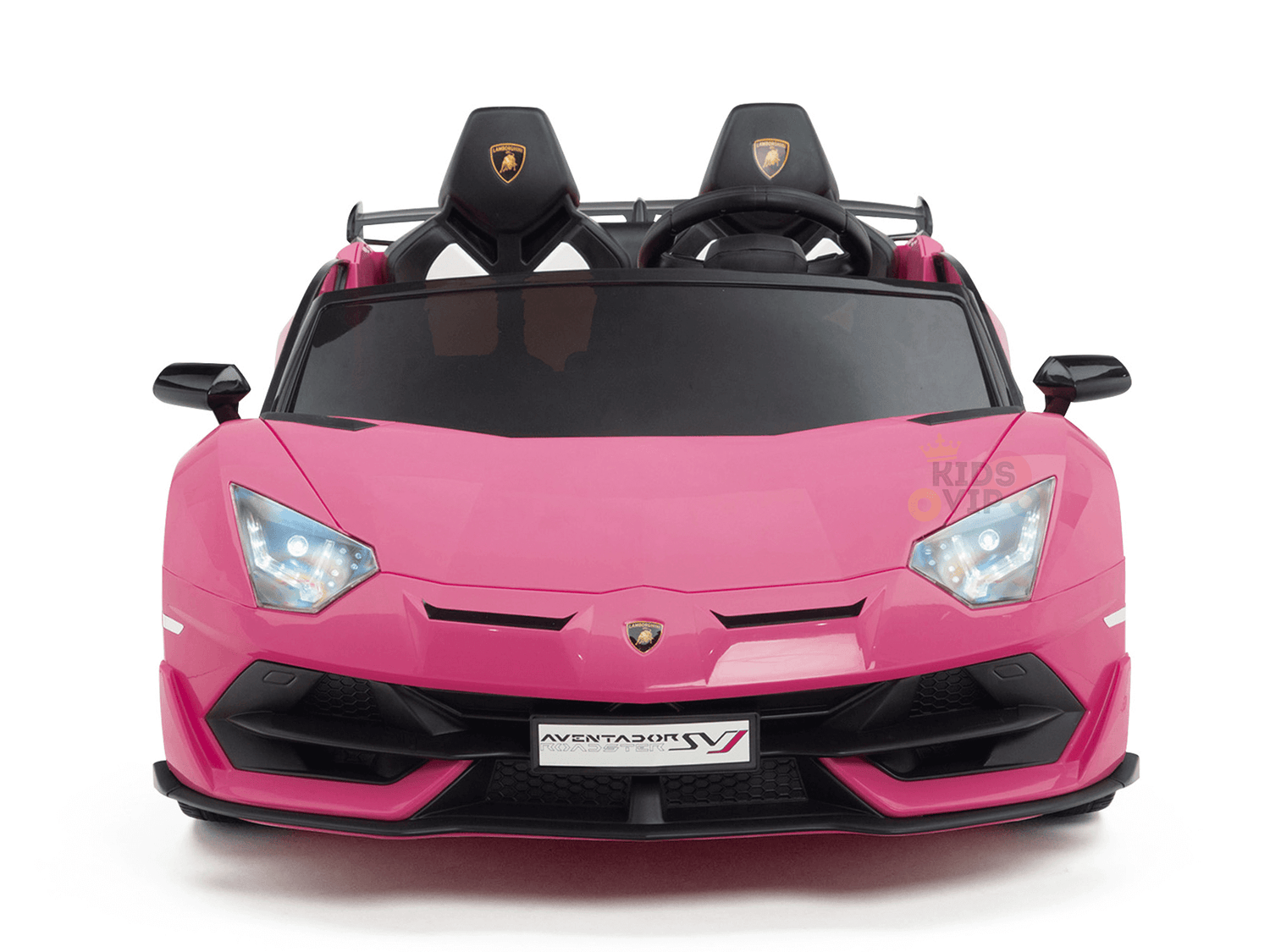 The Upgrade Your Ride with the Pink 24v Lamborghini SVJ Drifting Kids Ride on Car features LED headlights, drifting wheels, a detailed front grille, two black seats with headrests, an iconic logo on the front and seats, and a license plate reading AVENTADOR SV.
