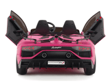 The Upgrade Your Ride with the Pink 24v Lamborghini SVJ Drifting Kids Ride on Car features open scissor doors, a detailed rear design with a black bumper, red taillights, and the iconic logo. The license plate reads AVENTADOR SV, perfect for thrilling adventures.