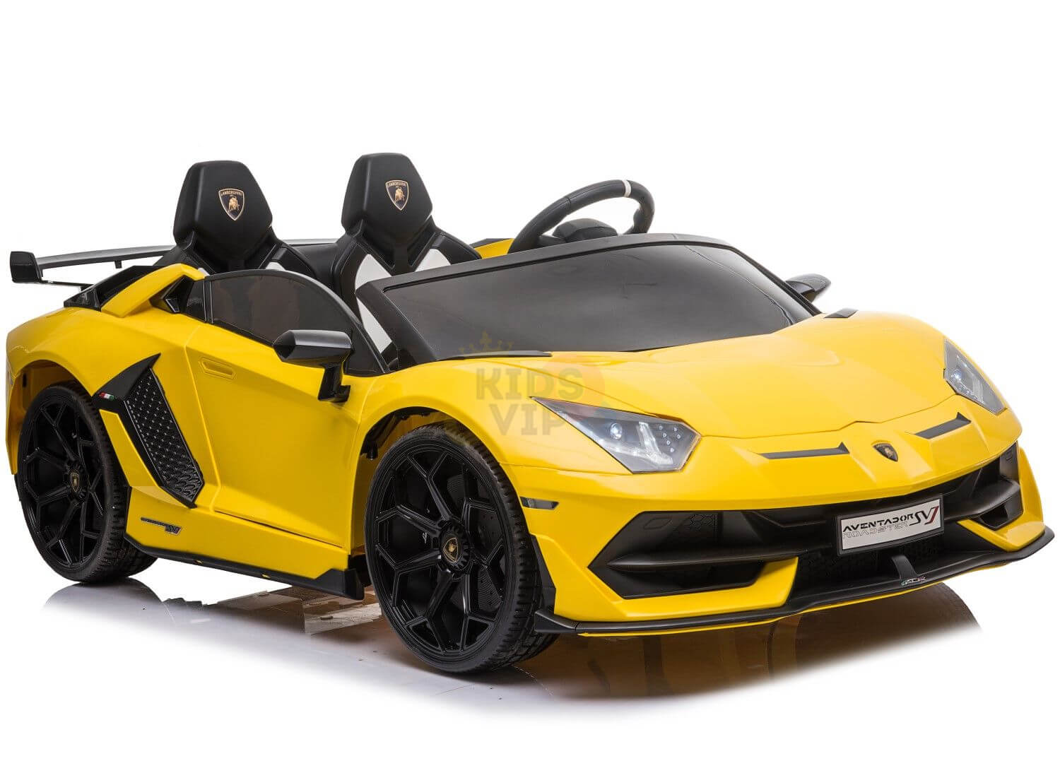 The Yellow 24v Lamborghini SVJ Drifting Kids Ride-On Car features black seats, a sporty design, drifting wheels, and detailed logos for an exciting driving experience. Perfect for little car enthusiasts with its two seats and steering wheel.