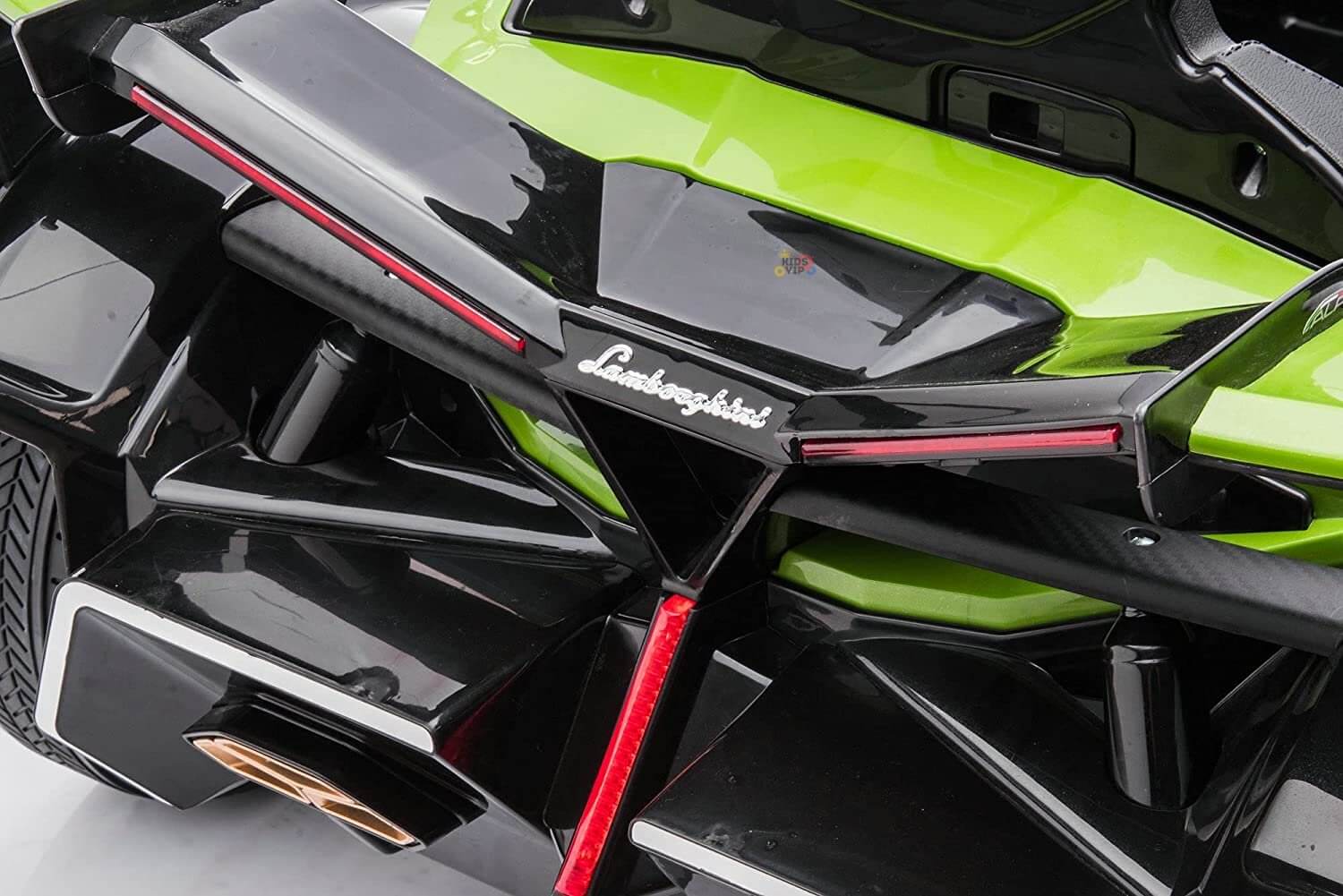 Close-up of the Green 12V Official Lamborghini Vision GT Kids Ride-On Car, featuring aerodynamic rear design, company logo, angular styling with sharp lines and sleek surfaces, highlighting its luxurious and sporty aesthetic.