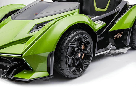 A close-up of the sleek Green 12V Official Lamborghini Vision GT Kids Ride on car, featuring futuristic green and black design with sharp angles, intricate wheels, a low profile, and stylish modern automotive elements powered by an innovative 12V battery system.