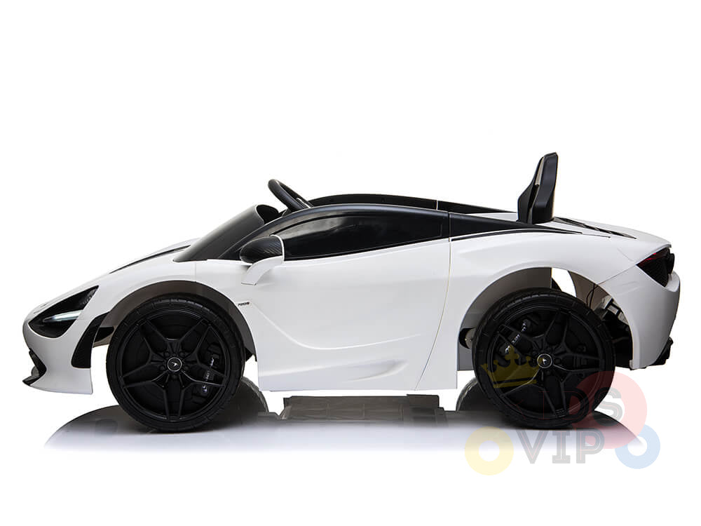 Side view of the White 12V McLaren 720S Kids Licensed 1 Seater Ride On Car, featuring black rubber wheels and a sleek design. This ride-on boasts a luxury car resemblance with remote control functionality, set against a plain white background.