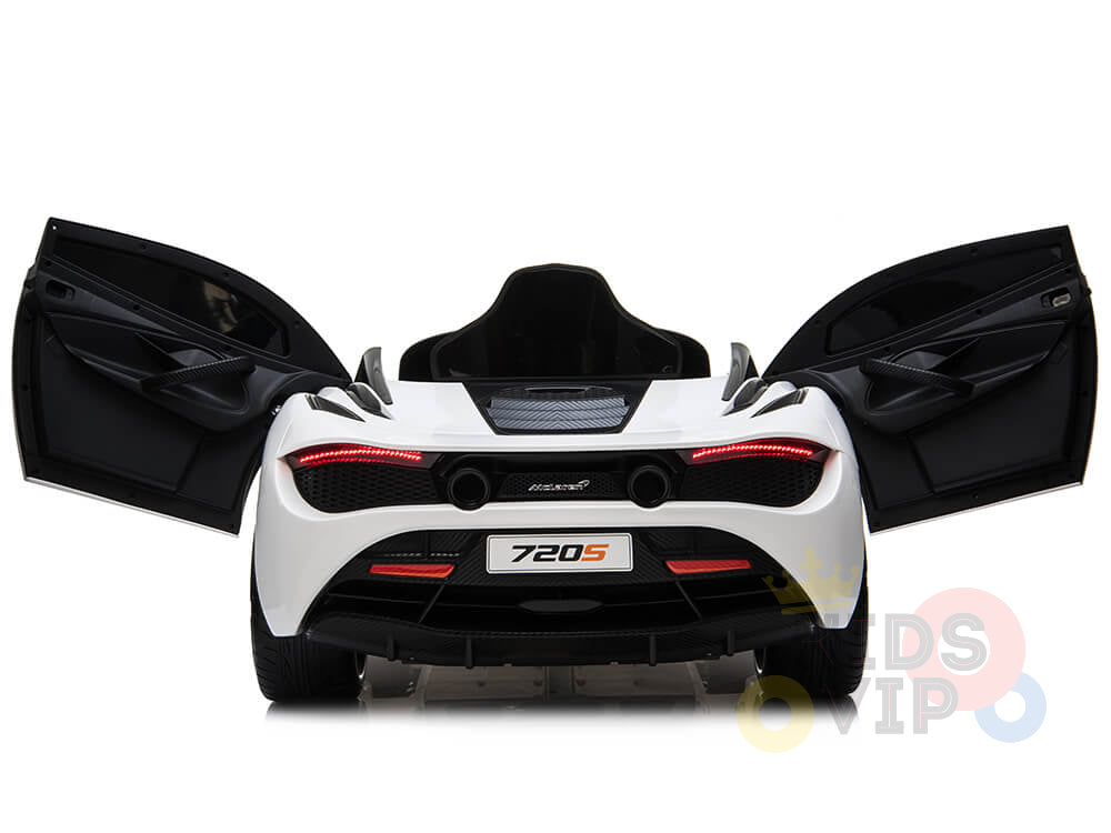 The rear of the White 12V McLaren 720S Kids Ride On Car, with its butterfly doors open, showcases upgraded features like modern tail lights and an aerodynamic build. The visible 720S plate adds elegance to this stunning ride.