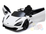 The image showcases a White 12V McLaren 720S Kids Licensed 1 Seater Ride On Car featuring sleek scissor doors, a black interior, detailed headlights, and rubber wheels. It includes a remote control for convenience and displays the Kids VIP logo in the corner.