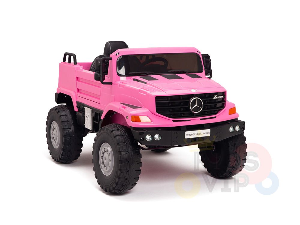 Introducing the Pink 12V Mercedes Benz Zetros Kids 1 Seater Ride On Truck: a vibrant toy vehicle with rubber wheels and a rugged design. Featuring a front grille with the iconic logo, small rearview mirrors, and remote control, its perfect for childrens adventurous rides.