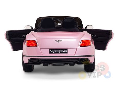 The rear view of the Pink 12V Bentley GTC Kids Licensed Ride On Car features open doors and visible taillights, with Supersports on the license plate. This Bentley Ride On with rubber wheels and remote offers excitement for little drivers.