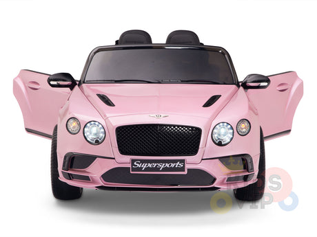 The Pink 12V Bentley GTC Kids Licensed Ride On Car features open gullwing doors, sleek black detailing, Supersports on the grille, and glowing headlights. Positioned against a white background, its perfect for little drivers with optional parental remote control.