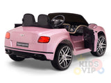 The Pink 12V Bentley GTC Kids Licensed Ride-On Car with Rubber Wheels is shown from the rear and side, featuring black seats, an open door, detailed dashboard, shiny wheels, and a partially visible Kids VIP logo. It includes a parental remote control for added safety.